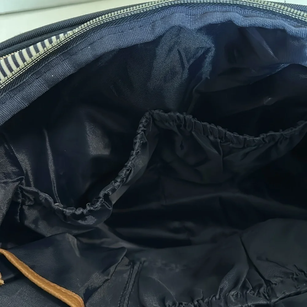 Bananafish breast pump/diaper backpack navy and white pin stripes